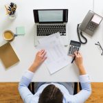 businesswoman with tax report at office